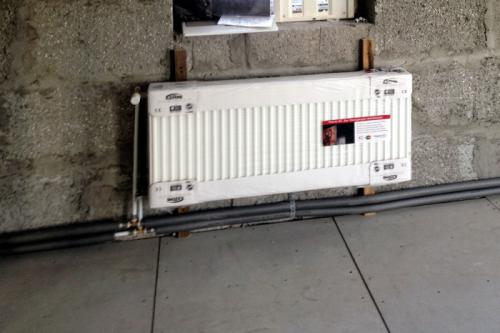 Система отопления многоквартирного дома с нижней разводкой. Характеристика